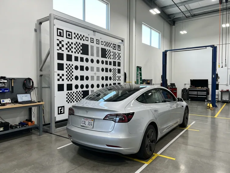 ADAS calibration targets set up in front of a car